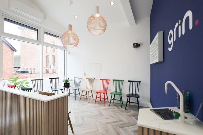 Smiles and creativity both shine at Grin Orthodontics with Vestaboard