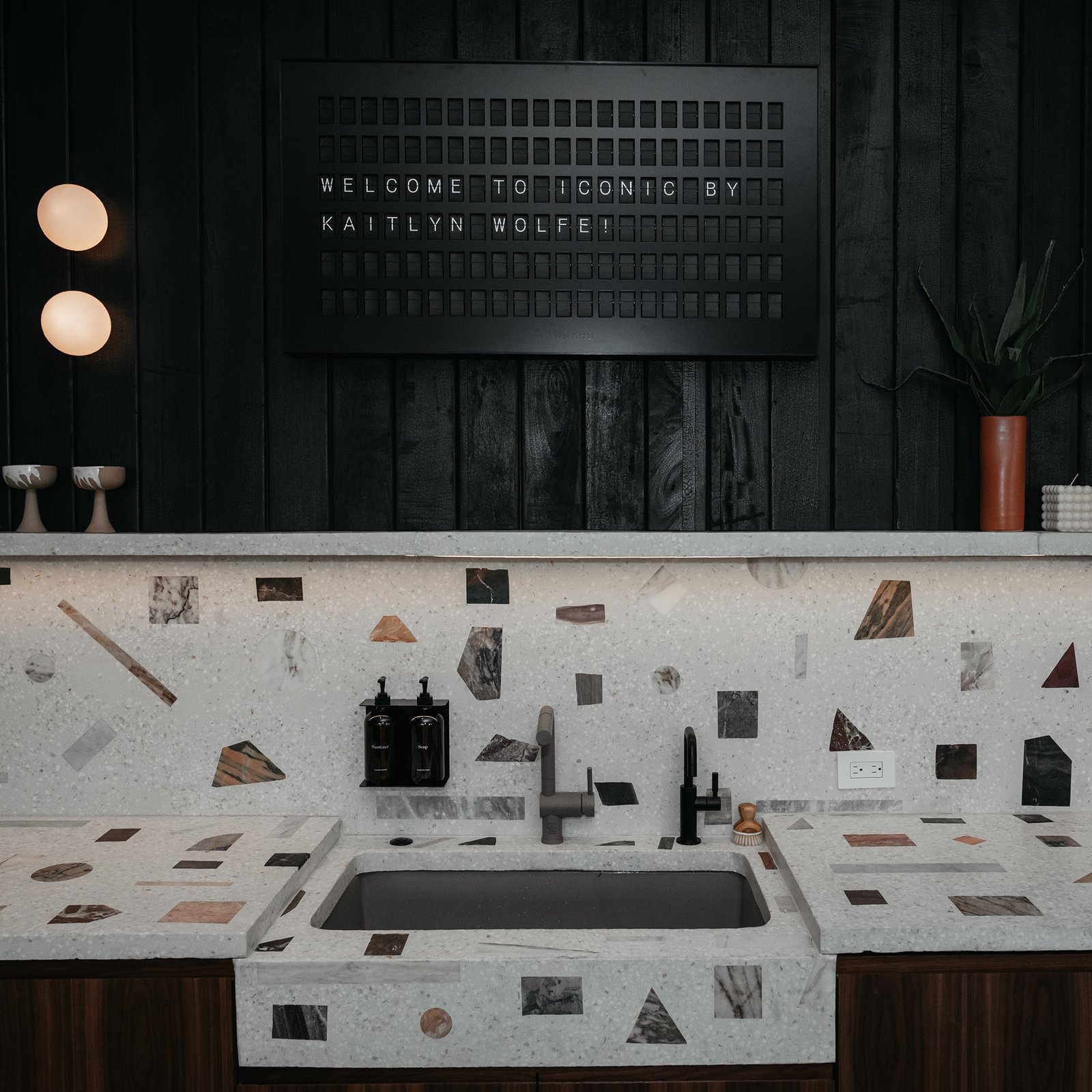 Interior designer chooses 'aesthetically stunning' Vestaboard for office